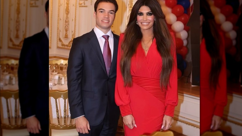 Kimberly Guilfoyle red dress with son at Mar-a-Lago