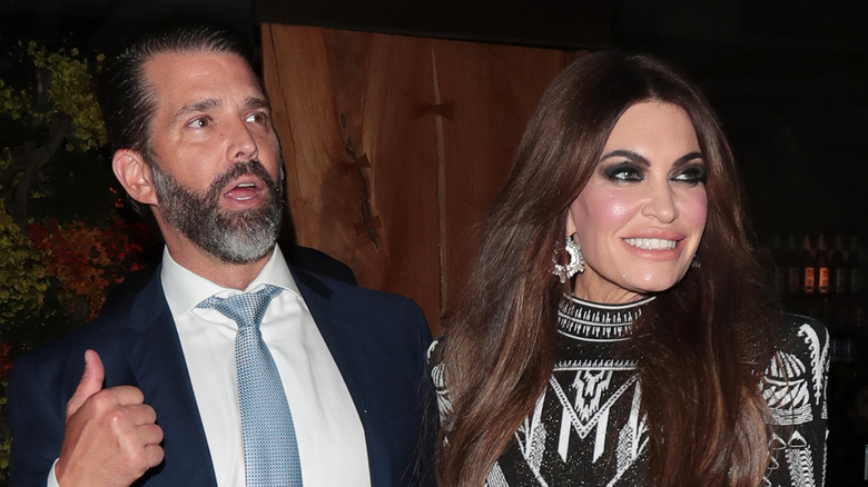 Donald Trump Jr. and Kimberly Guilfoyle standing together