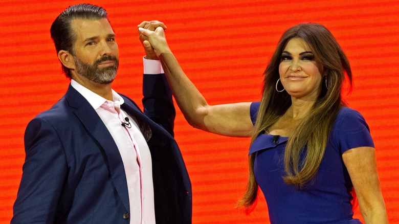 Donald Trump Jr. and Kimberly Guilfoyle high-fiving