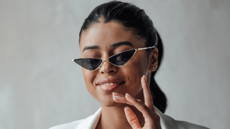 woman wearing cat eye glasses