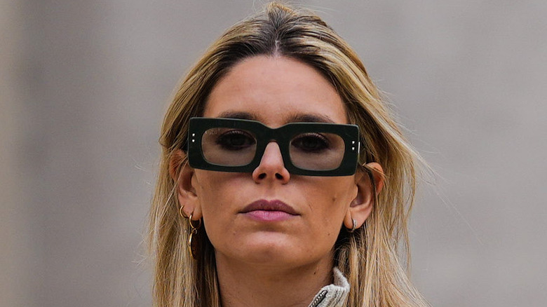 woman wearing rectangular sunglasses