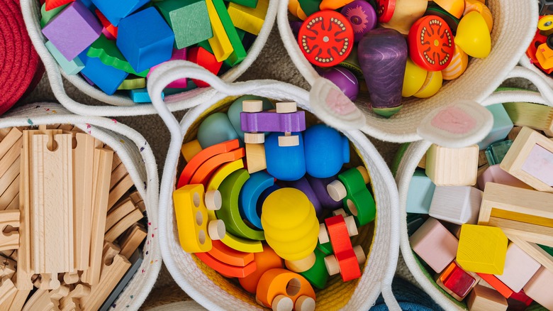 organizational bins divide colorful toys