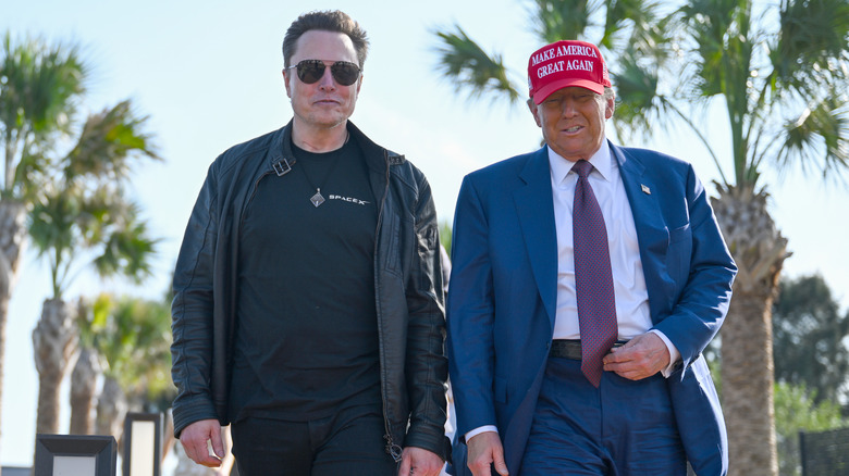 Elon Musk and Donald Trump walking