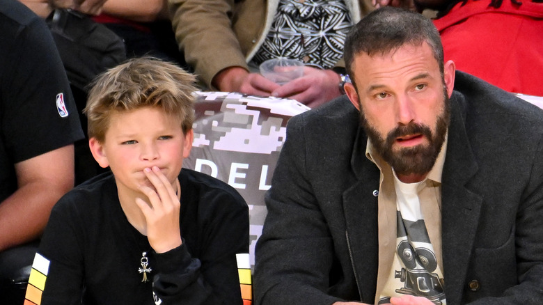 Ben Affleck watching a game with his son