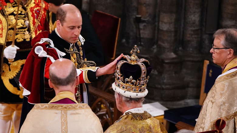 Prince William touches crown of King Charles at coronation