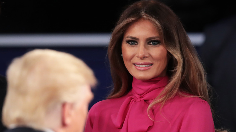 Melania Trump looking at Donald Trump during a 2016 presidential debate