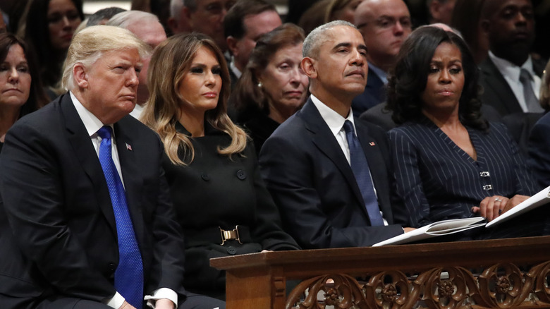 Michelle and Barack Obama with Donald and Melania Trump at a funeral