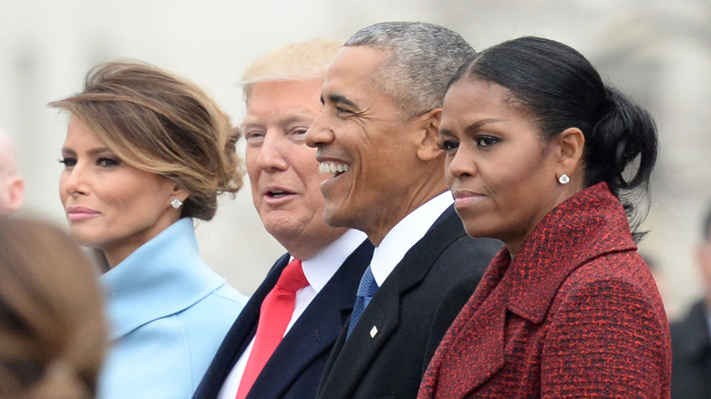 Melanie and Donald Trump, Barack and MIchelle Obama standing together