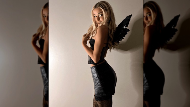 Olivia Dunne poses in an angel costume 