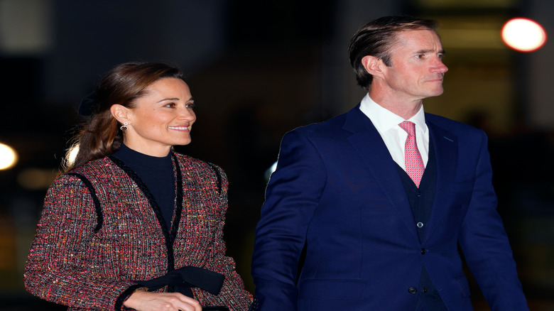 Pippa Middleton smiles next to her husband, James Matthews