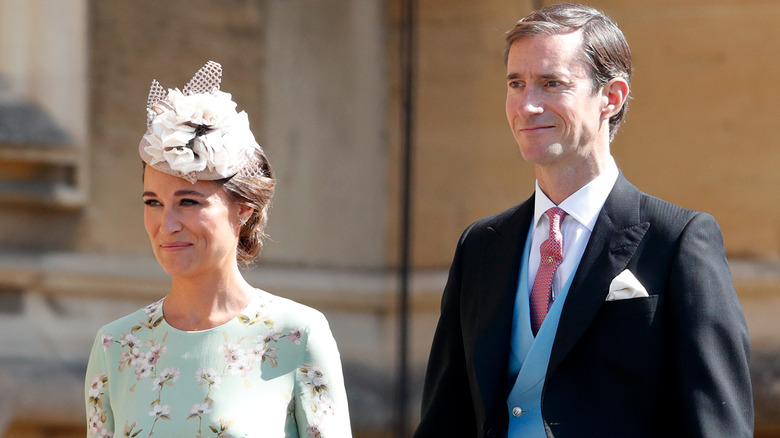 Pippa Middleton and James Matthews holding hands