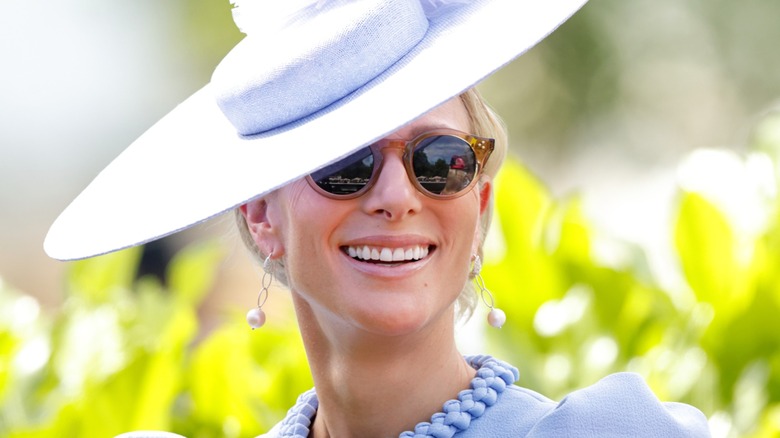 Zara Tindall smiling in sunglasses