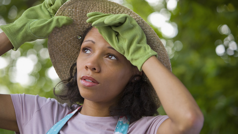 woman gardening on hot day