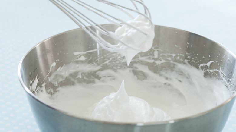 meringue being whipped in bowl