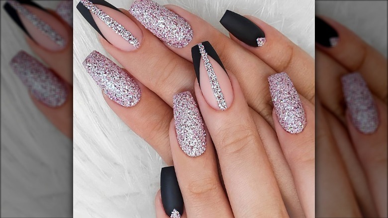 glitter nails with black tuxedo accents