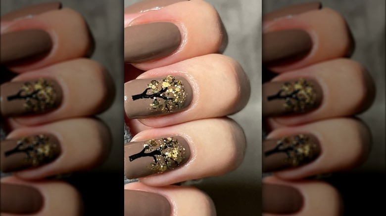 brown nails with gold glitter trees