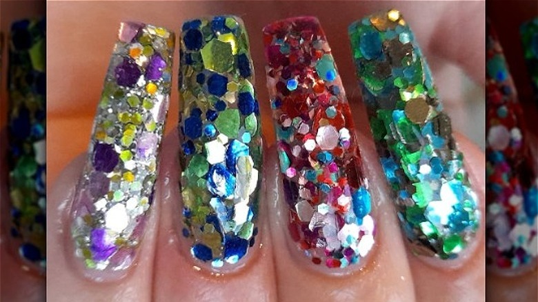 different color nails with jewel glitter