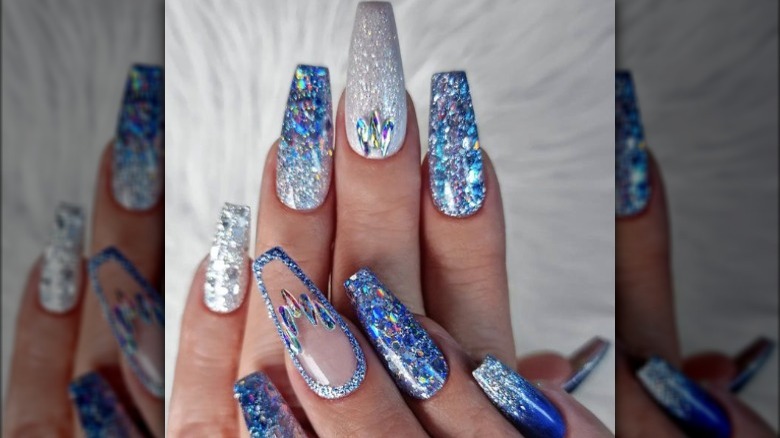 blue with silver glitter with each nail different blue with silver glitter with each nail different