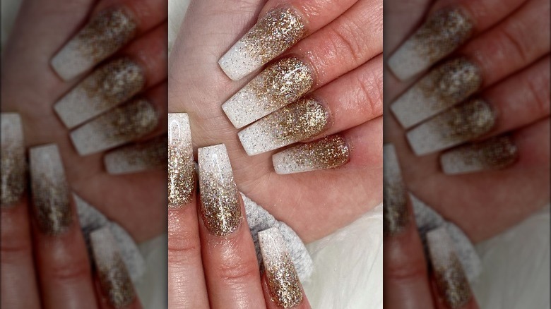 gold glitter ombre on white nail