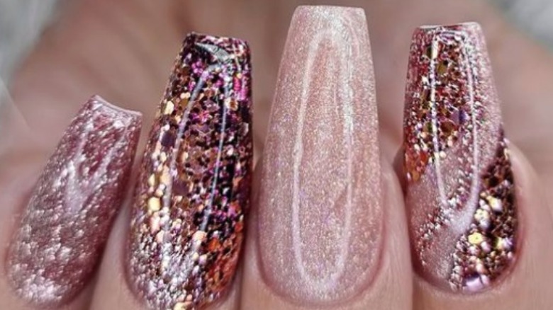 rose-gold nails with various rose-gold glitter