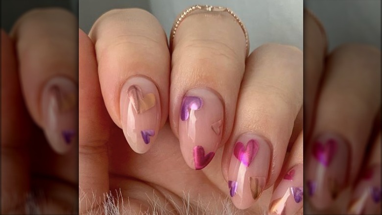 Chrome heart nail design 