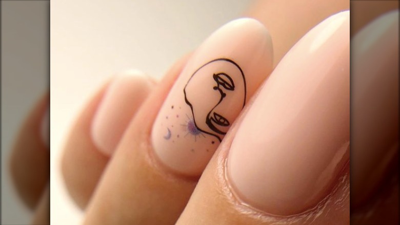 Abstract face on nail 