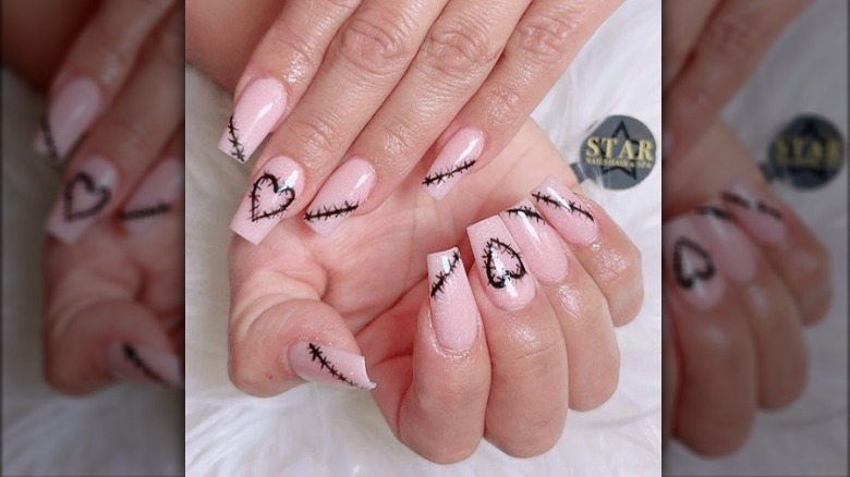 Stitch design on nude nails 