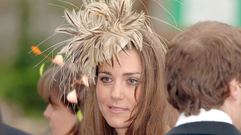 Princess Catherine wearing a feather hat 