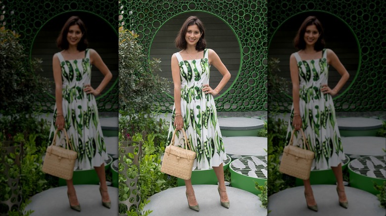 Jasmine Hemsley smiles in green and white dress 