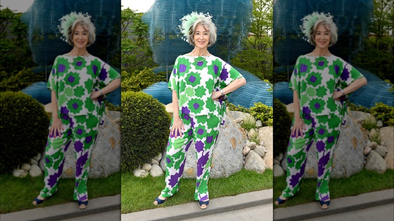 Maureen Lipman poses in green outfit 