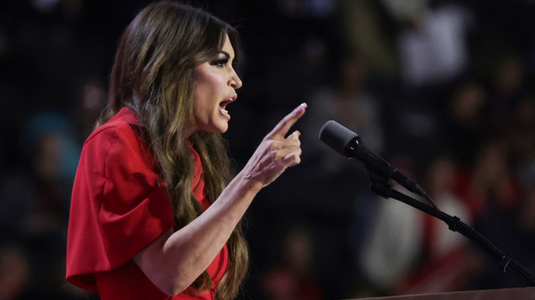 Kimberly Guilfoyle pointing a finger at the audience as she delivers a speech