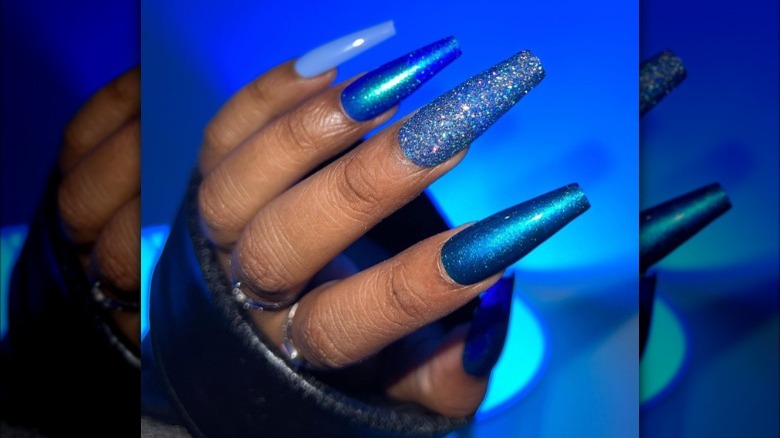 Blue Skittles nails 