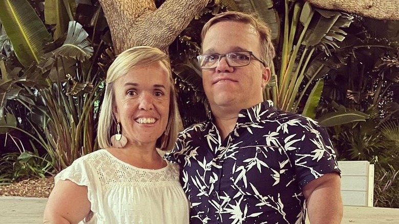 Trent and Amber Johnston pose for a photo on vacation