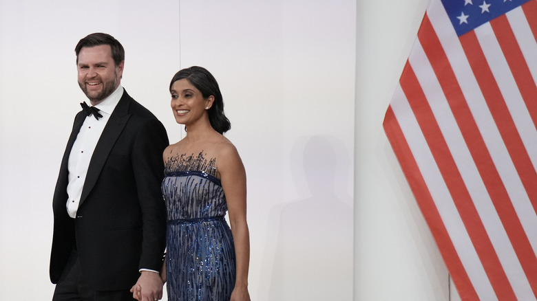 JD Vance and Usha Vance hold hands