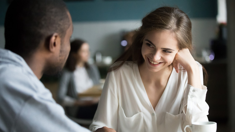 woman flirting with man