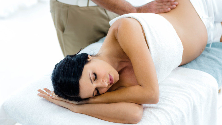 pregnant woman getting a massage