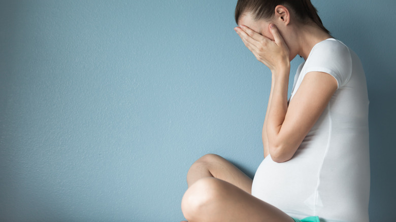 pregnant woman crying