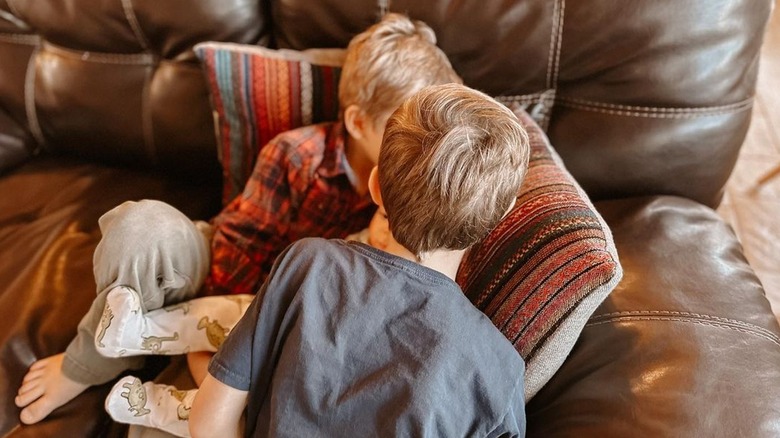 Dillard children on leather sofa