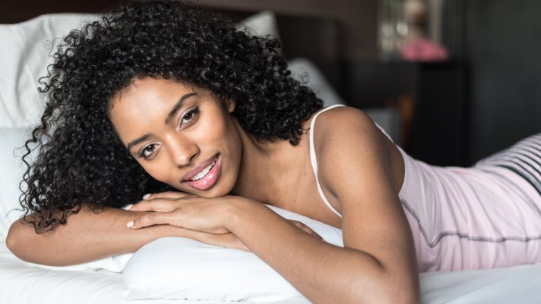 Woman resting on pillow