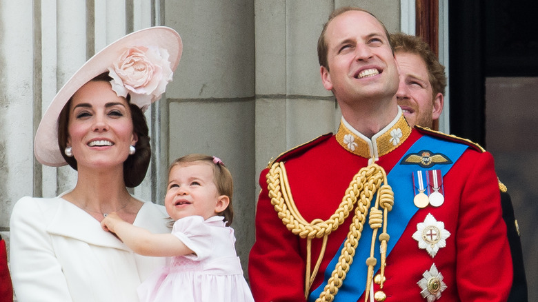 William, Catherine, & baby Charlotte on balcony