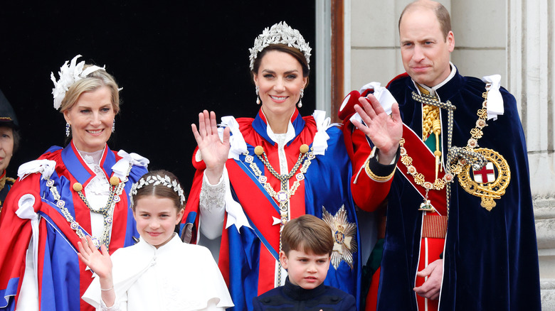 Royals waving from balcony at coronation