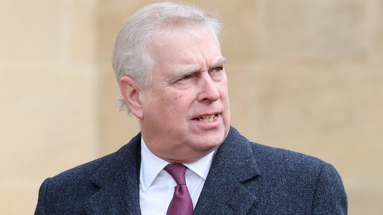 Prince Andrew frowning