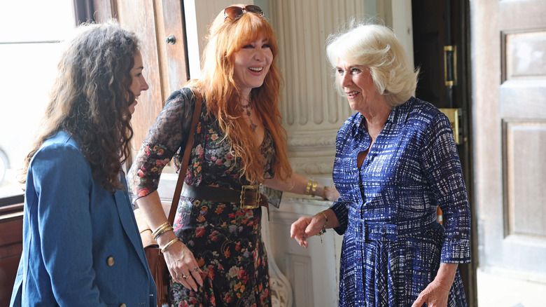 Rose Hanbury laughing with Queen Camilla and Charlotte Tilbury