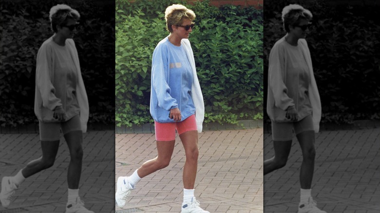 Princess Diana in her iconic cycling shorts and sweatshirt