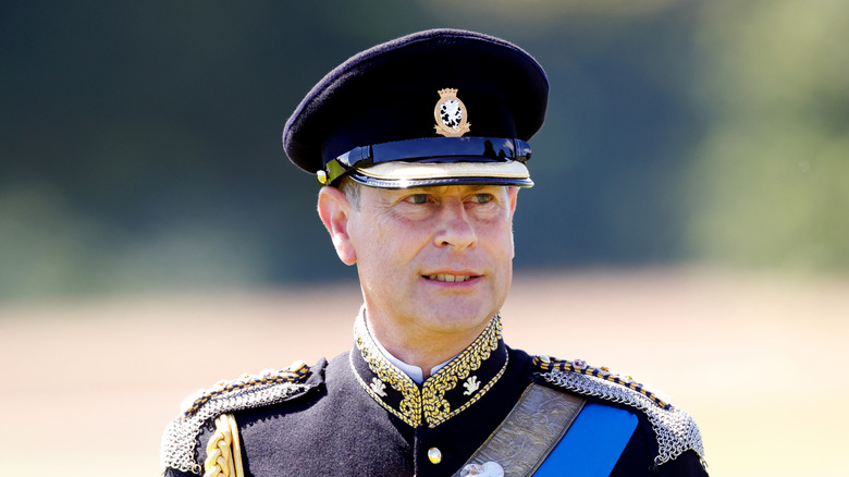 Prince Edward looks on in uniform 