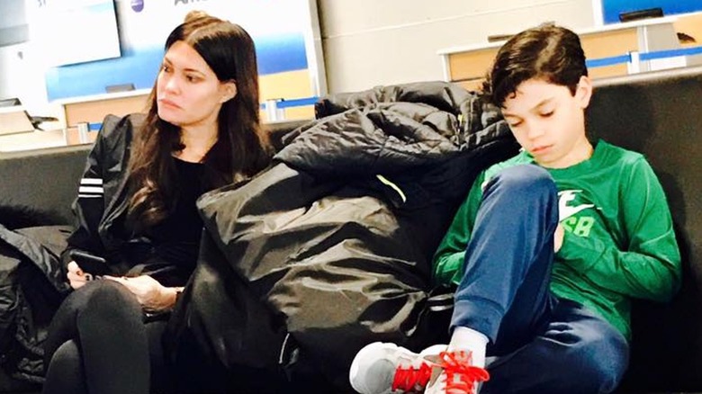 Kimberly Guilfoyle at the airport with her son Ronan