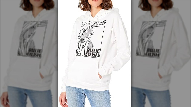 Model wearing a white Billie Eilish sweatshirt