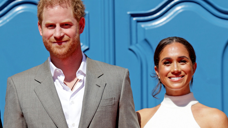 Harry and Meghan smiling