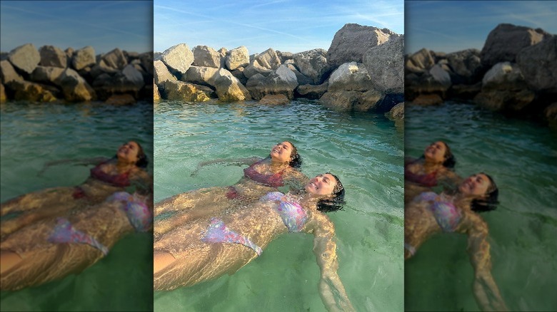 Two women floating in a natural pool