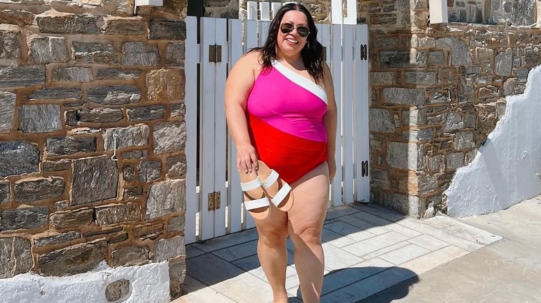 Woman wearing a Summersalt swimsuit